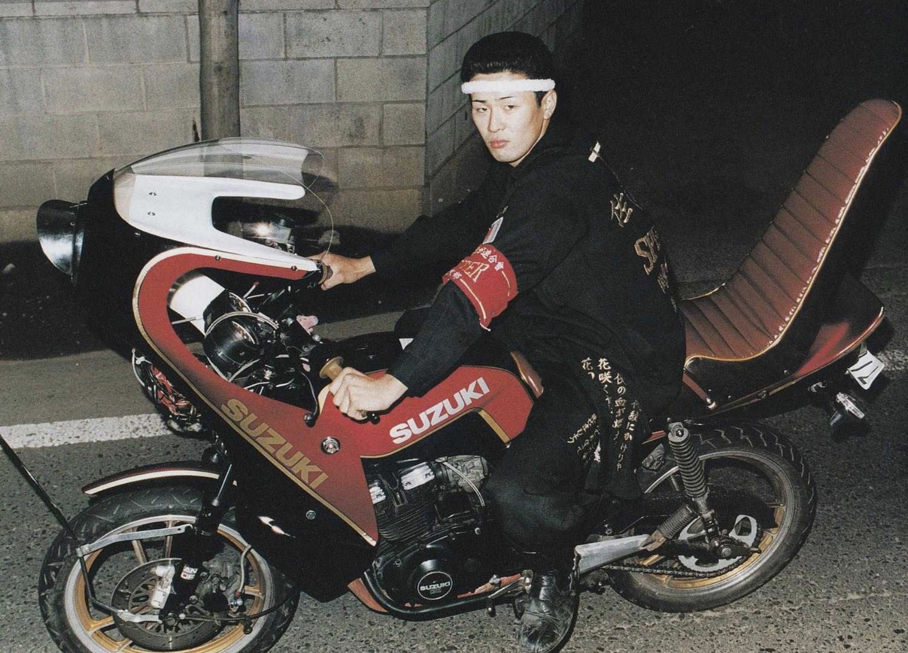A Bōsōzoku rider on his custom bike.